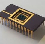 The image shows a computer chip with a built in memristor the researchers used during their research.