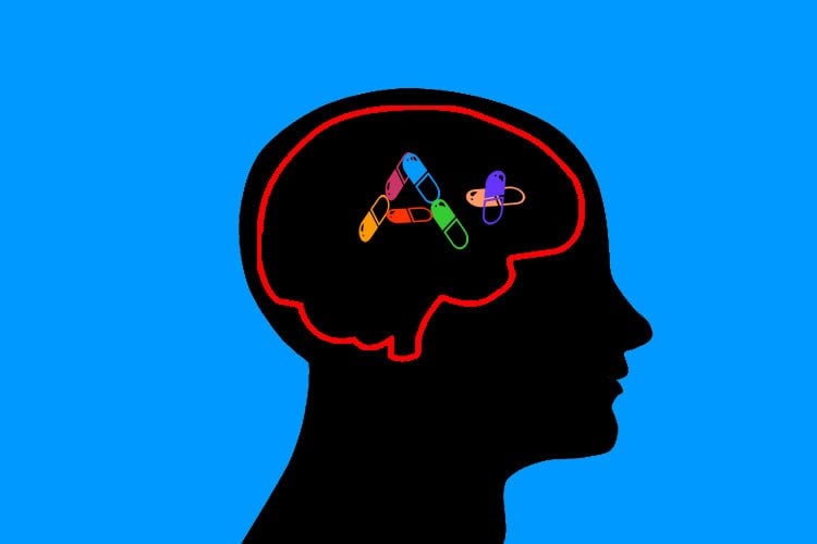 This image shows an outline of a head with a+ written in pills.