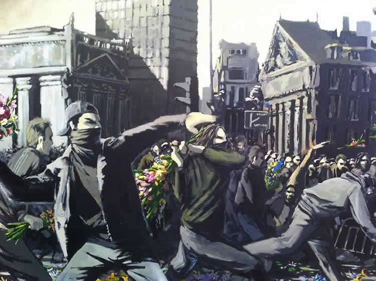 The image shows one of Banksy's murals called 'Riot'.