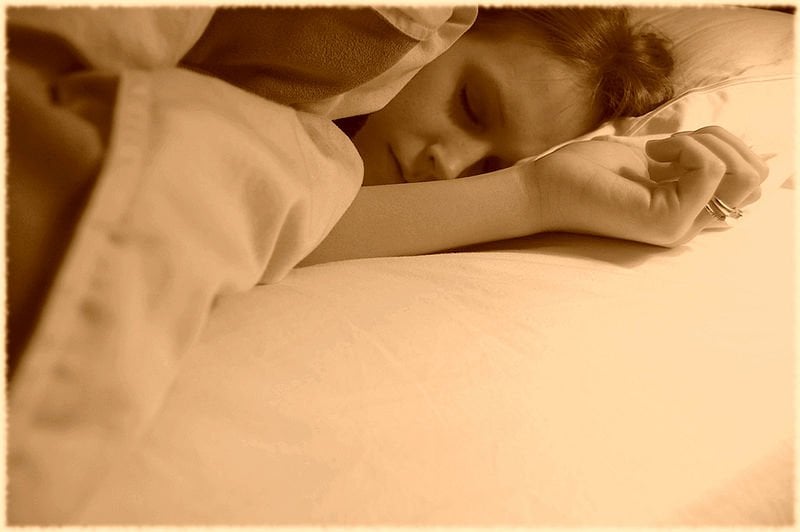 This image shows a sleeping woman.
