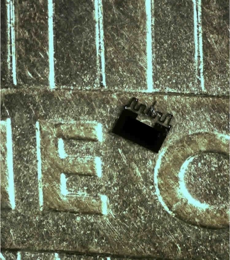 This image shows the microbot on a penny.