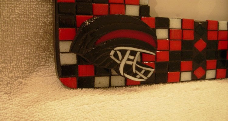 This image shows a mosaic of a Hillcrest Rams high school football helmet.