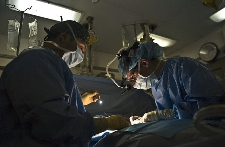 This image shows two surgeons performing an operation.