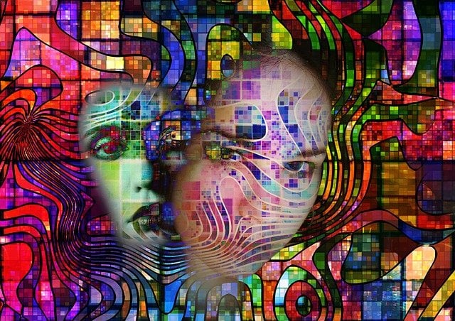 colorful blocks surround a person's face.
