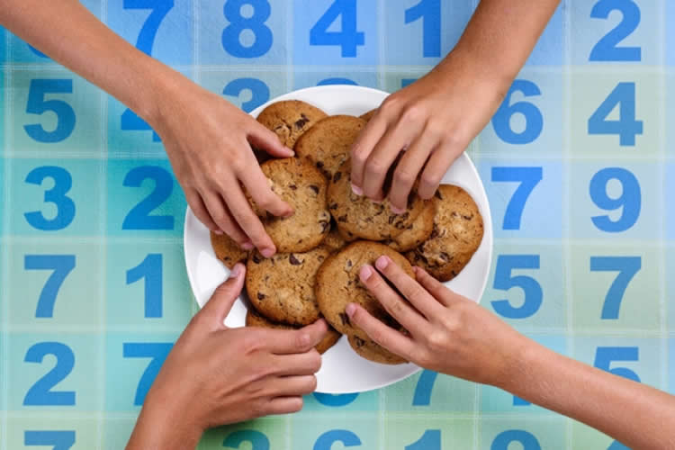 Image of hands taking cookies.