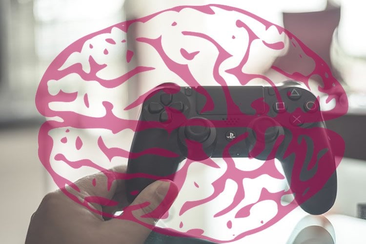 Image of a brain overlaying a video game controller.
