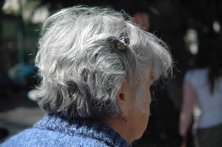 Image shows an old lady.
