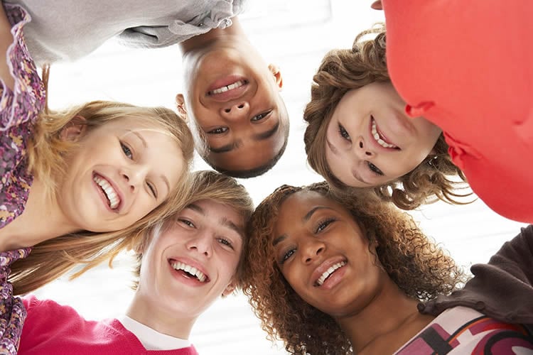 Image shows a group of teens.