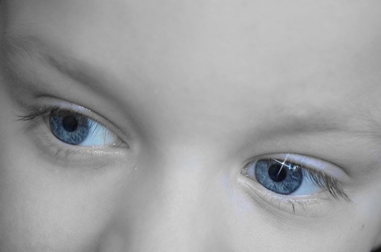 Image shows a child's eyes.