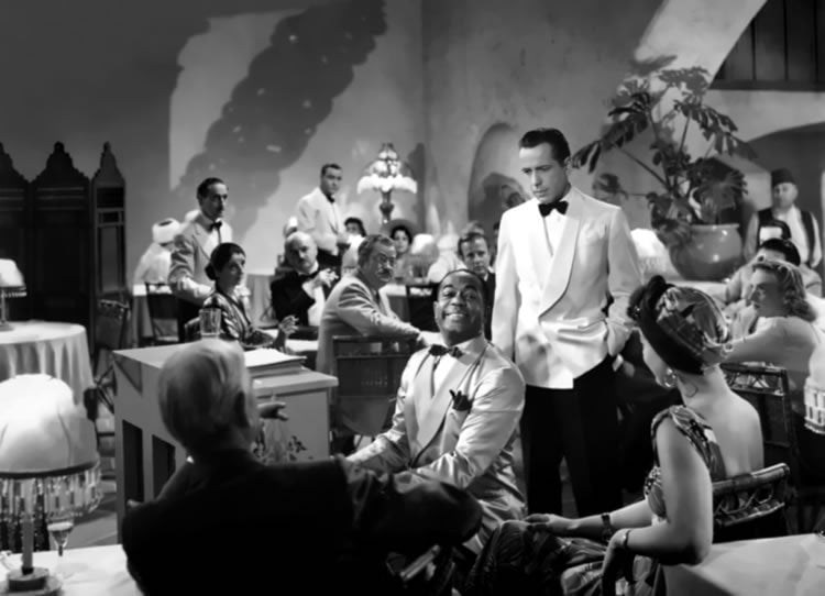 Image shows a scene from Casablanca.