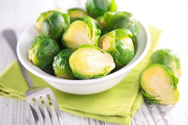 Image shows a bowl of brussle sprouts.