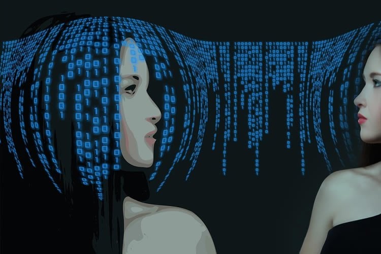 Image shows a woman surrounded by binary code to imply artificial intelligence.