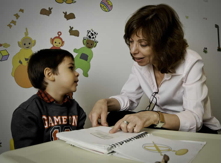 Image shows the researcher and a child.