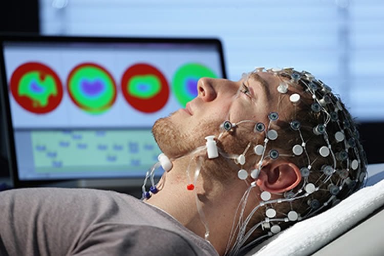 A person in an EEG cap.