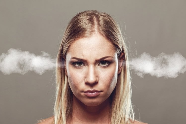 Image shows a woman with steam shooting out of her ears.