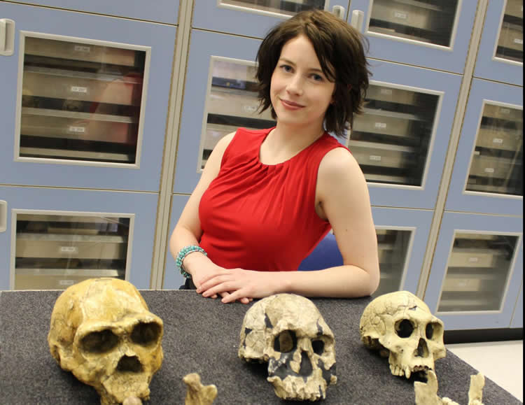 Image shows the researcher with skulls.