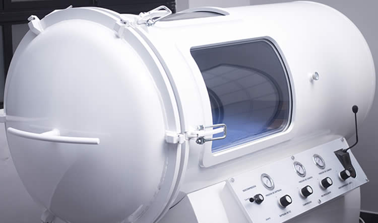 Image shows a hyperbaric oxygen chamber.
