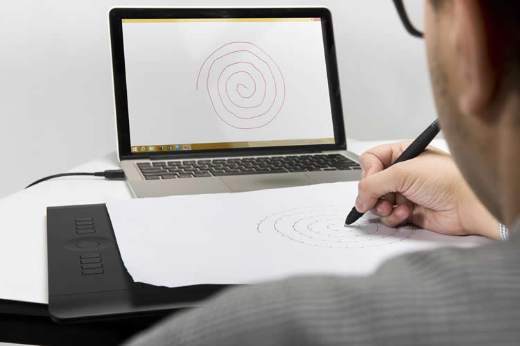 Image shows a person coping a spiral drawing.
