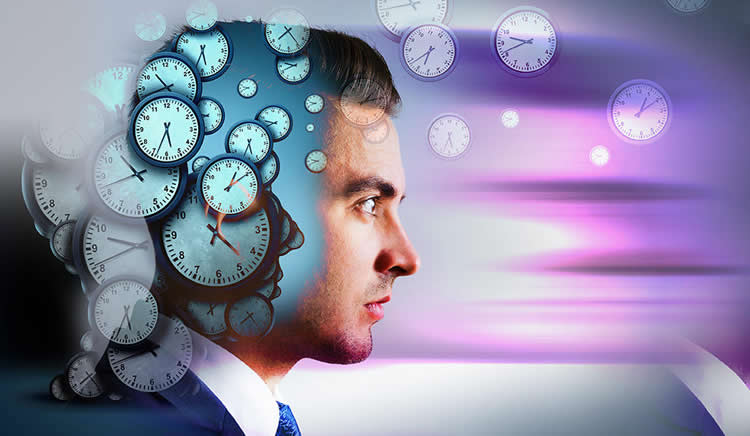 Image shows a a man's head made up of clocks.