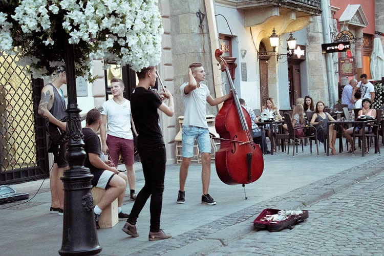 Image shows street musicians.