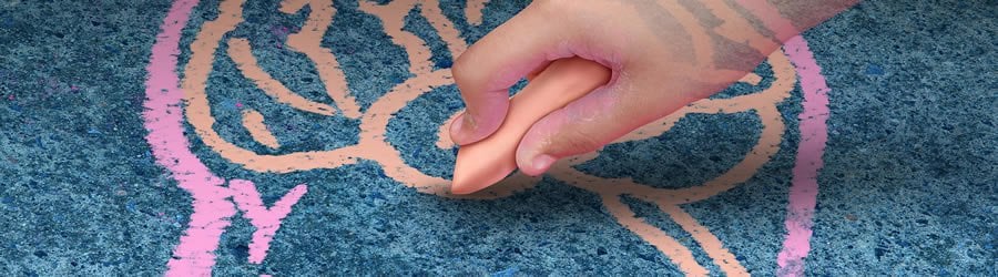 a child drawing on the floor with chalk