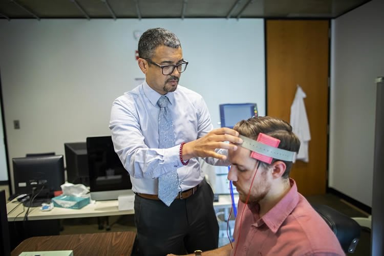 the researcher carrying out tDCS