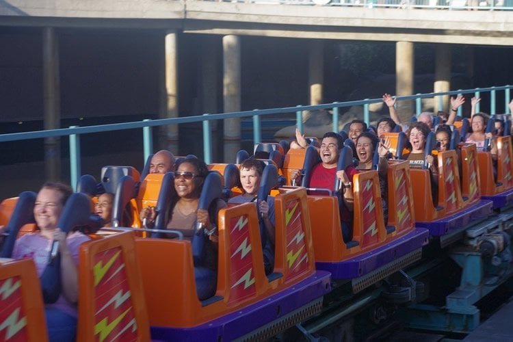 people on a roller coaster