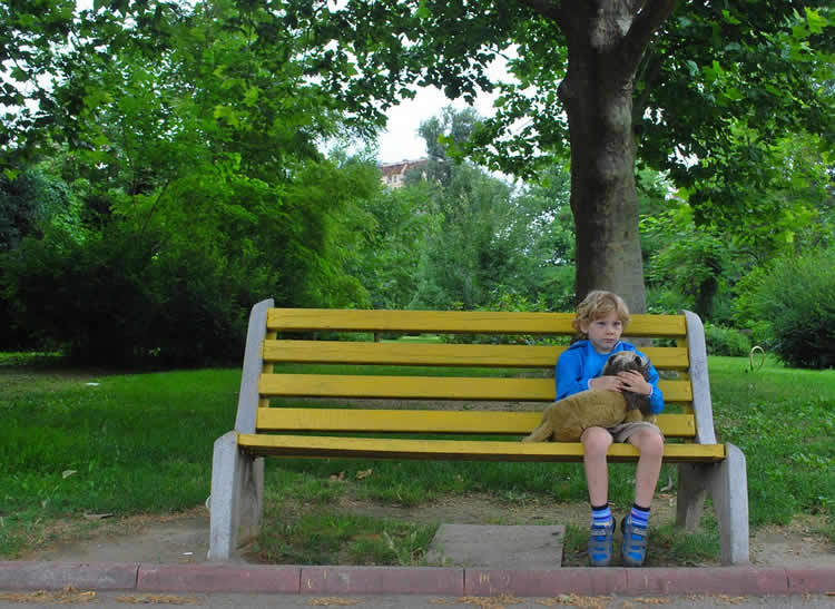 a child on a bench