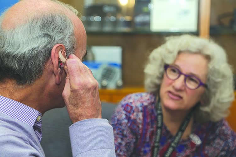 a man with a hearing aid