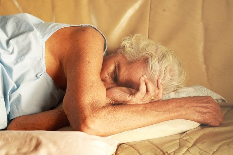 An older lady sleeping