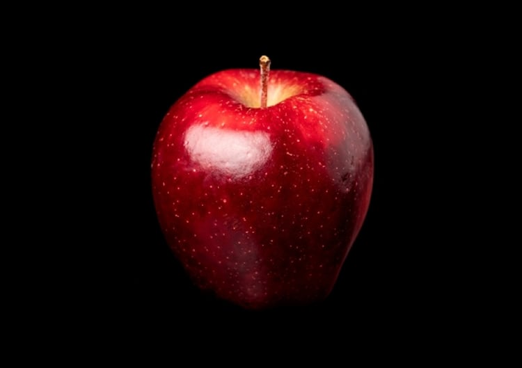 This is a shiny red apple