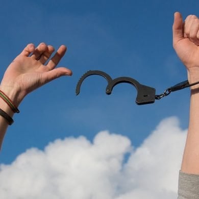 This shows hands breaking free of hand cuffs