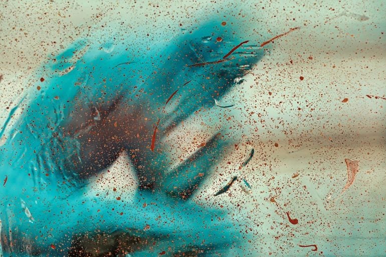 This shows a blurry blue man