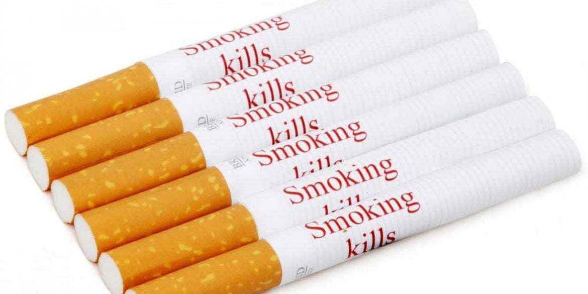 This shows the cigarette with the warnings written on them