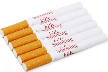 This shows the cigarette with the warnings written on them