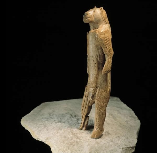 This shows an ancient statue of a lion man