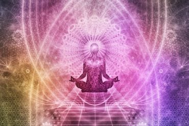 This shows a person in the lotus position with a psychedelic background