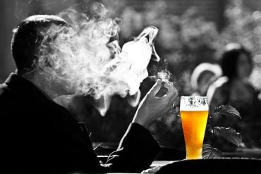 This shows a beer and smoke