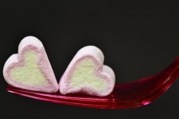This shows two heart shaped marshmallows