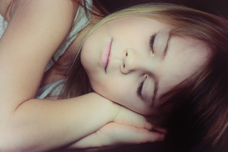 This shows a little girl sleeping