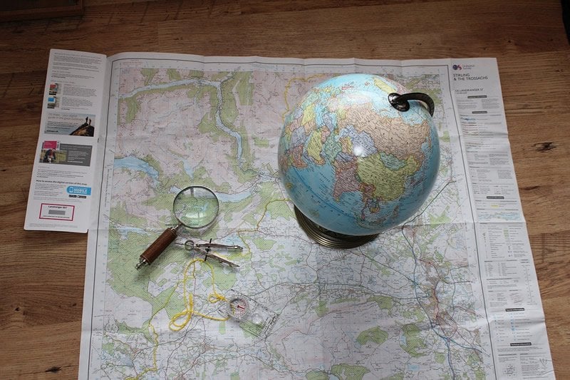 This shows a map and a globe