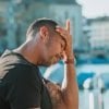 This shows a stressed looking man