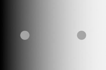 This shows two dots against a monochrome gradient background