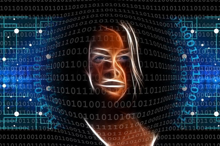 This shows a woman's face and computer code