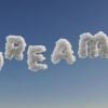 This says dreams written in clouds