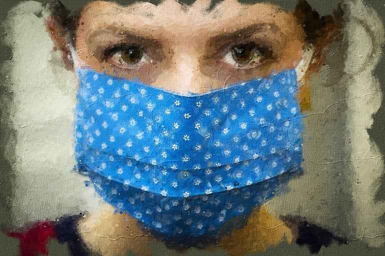 This shows a woman in a facemask
