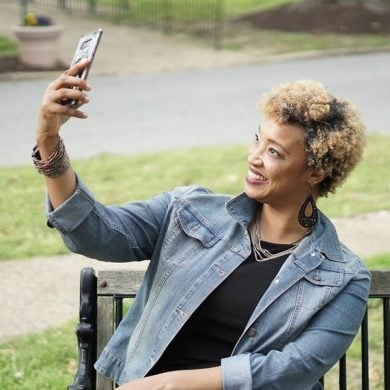 This shows a lady taking a selfie