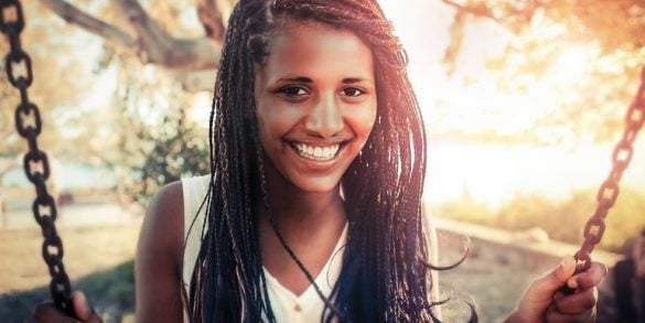 This shows a smiling girl