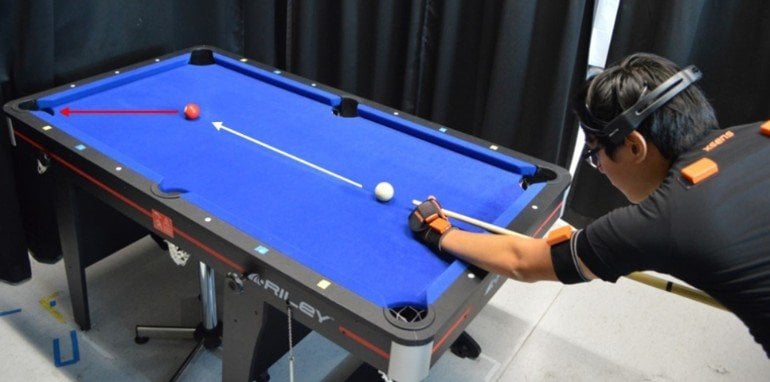 This shows a person playing pool