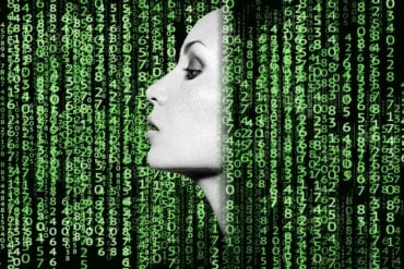 This shows a woman's face surrounded by computer code